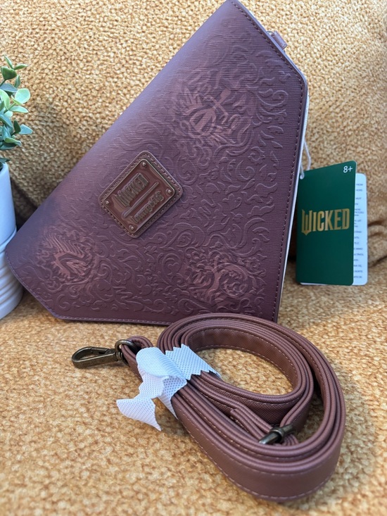 Loungefly Handbags - Loungefly “wicked” Embossed Triangular Crossbody Bag - Mauve